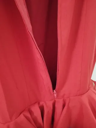 Traje de flamenca rojo con bordados