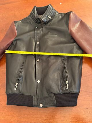 Giubbotto in pelle nero e bordeaux