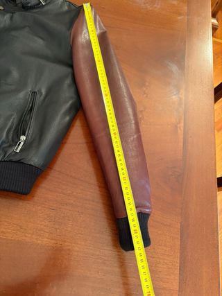 Giubbotto in pelle nero e bordeaux