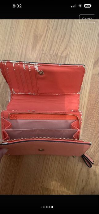 Bolso rosa con tachuelas