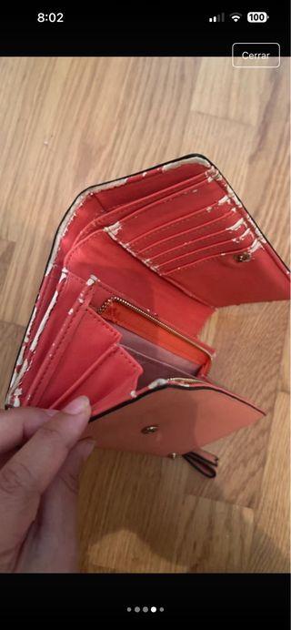 Bolso rosa con tachuelas