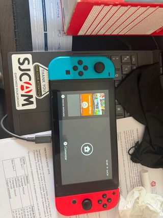 Nintendo Switch + Joy-Con Blu e Rosso