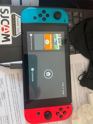 Nintendo Switch + Joy-Con Blu e Rosso