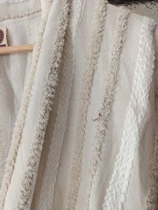 Chaqueta boho conchas y flecos