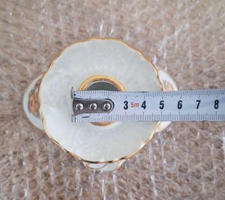 Antigua pareja de candelabros de porcelana Bavaria