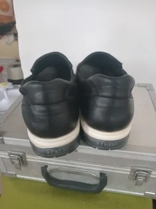 Zapatos negros 24 horas