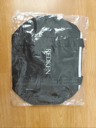 Bolsa Redken Negra Nuevas