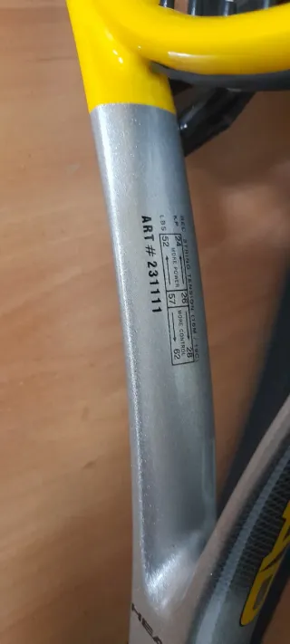 Raqueta de tenis HEAD con funda Wilson