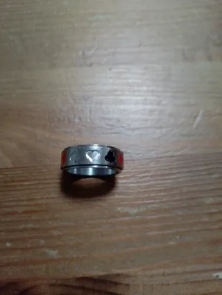 Anillo giratorio con naipes