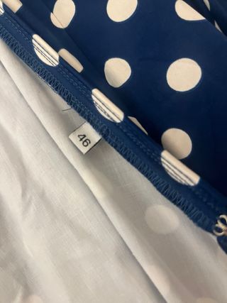 Traje de flamenca azul con lunares blancos