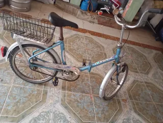Bicicleta Plegable Azul con Cesta