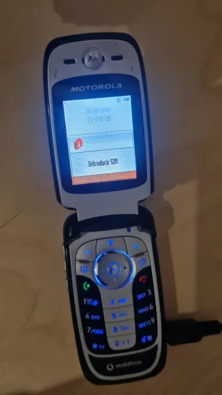 Motorola Plata y negro + cargador