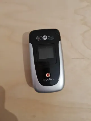 Motorola Plata y negro + cargador