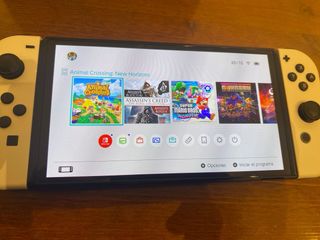 Nintendo Switch OLED Blanca + 2 Mandos + 2 Juegos