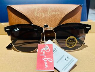 Gafas de sol Ray-Ban Clubmaster negras y doradas