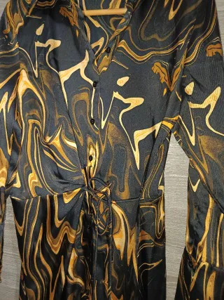 Vestido H&M estampado negro y dorado