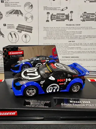 Lote 2 coches slot Carrera Evolution Nissan y Audi