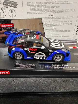 Lote 2 coches slot Carrera Evolution Nissan y Audi