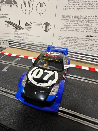 Lote 2 coches slot Carrera Evolution Nissan y Audi