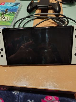 Nintendo Switch + 4 Giochi