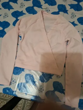 Body ginnastica rosa con tutù e cardigan