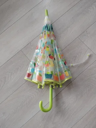 Paraguas infantil transparente con ranas.
