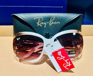 Gafas de sol Ray-Ban blancas y marrones