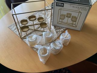 Porta velas dourado com 5 vidros