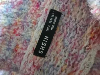 Jersey punto multicolor cuello alto