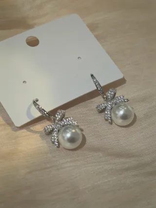 Orecchini perla bianca con fiocco zirconia elegant