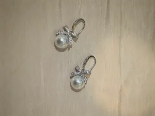 Orecchini perla bianca con fiocco zirconia elegant