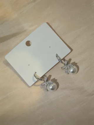 Orecchini perla bianca con fiocco zirconia elegant