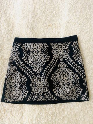 Falda mini Stradivarius lentejuelas doradas