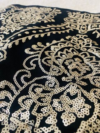 Falda mini Stradivarius lentejuelas doradas