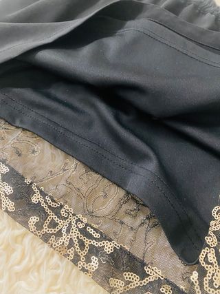 Falda mini Stradivarius lentejuelas doradas