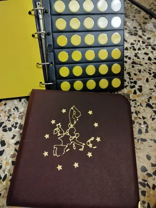 Álbumes de colección de monedas y billetes