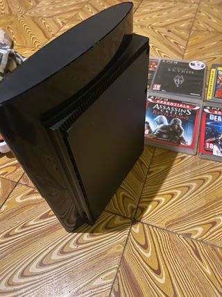 Console PS3 nera + controller + 8 giochi