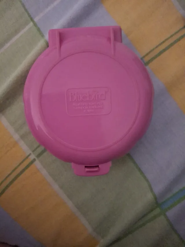Polly Pocket polvera rosa con una muñeca