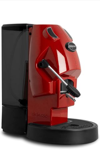 Macchina da caffè a capsule rossa nuova