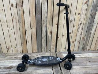 PATINETE OXELO 4 RUEDAS NEGRO