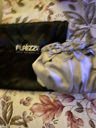 Bolso de fiesta plateado con flores