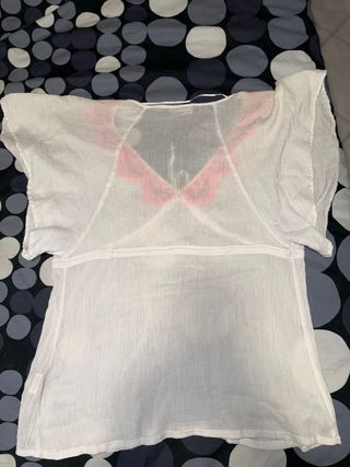 Copricostume bianco con dettagli rosa