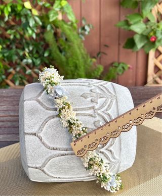 Corona de flores preservadas