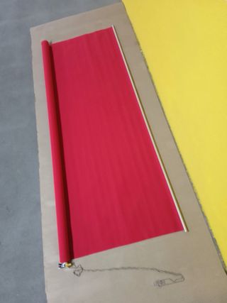 Estor enrollable tela rojo y amarillo