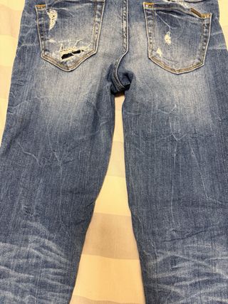 Pantalones pitillo Guess rotos azules