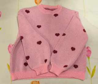 Jersey rosa oversize con corazones