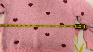 Jersey rosa oversize con corazones