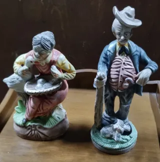 Figuritas porcelana hombre y mujer animales