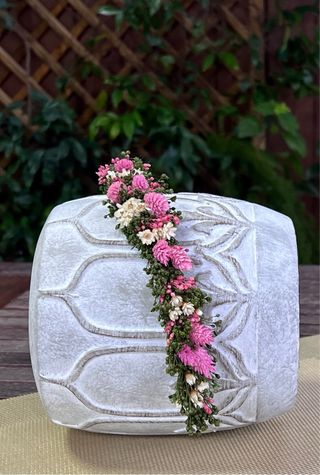 Corona de flores preservadas