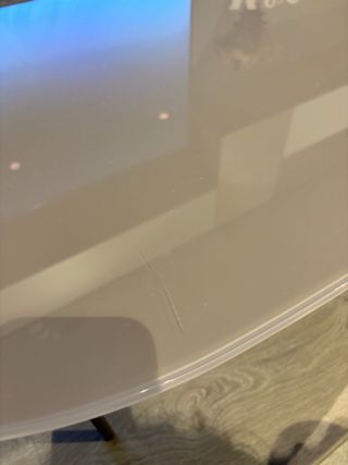 Mesa de centro cristal y metal ovalada